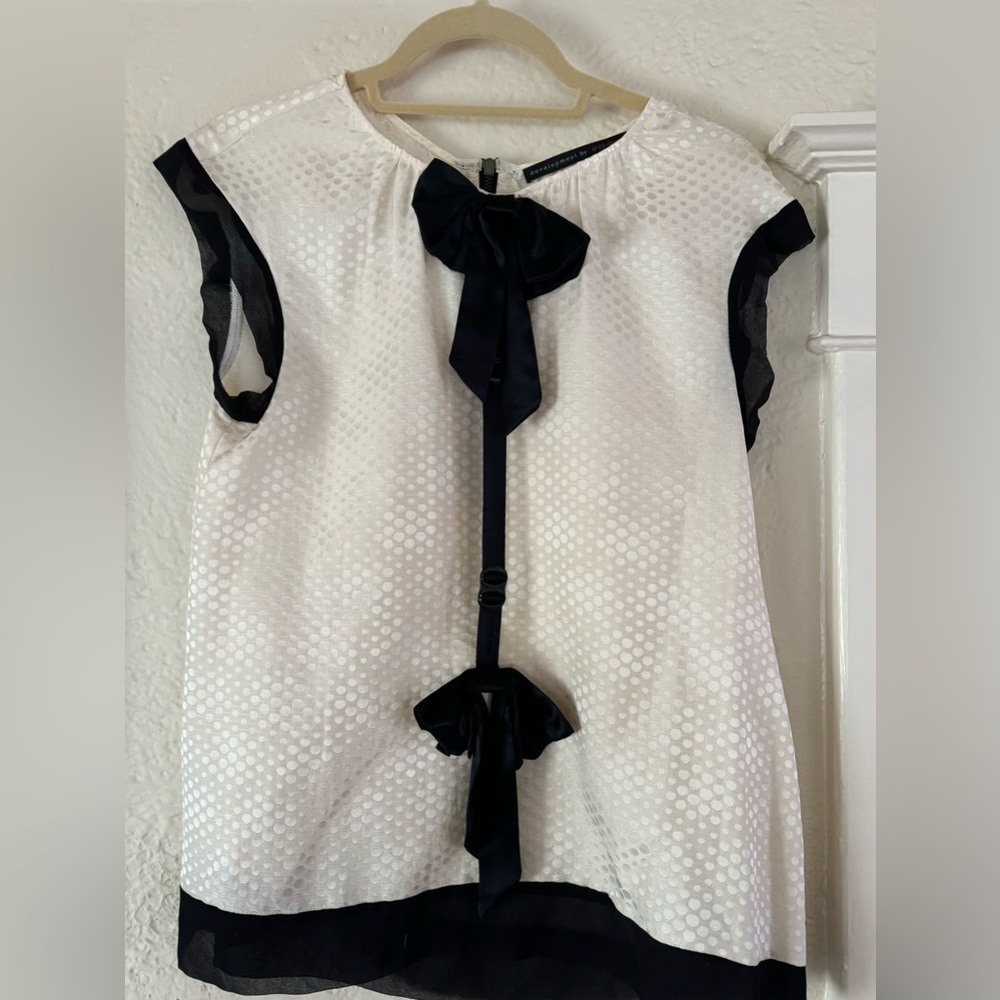 Silk sleeveless polka dot top with black bows & trim-Development by Erica Davies